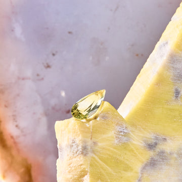 xx ct. yellow pear sapphire and jasper
