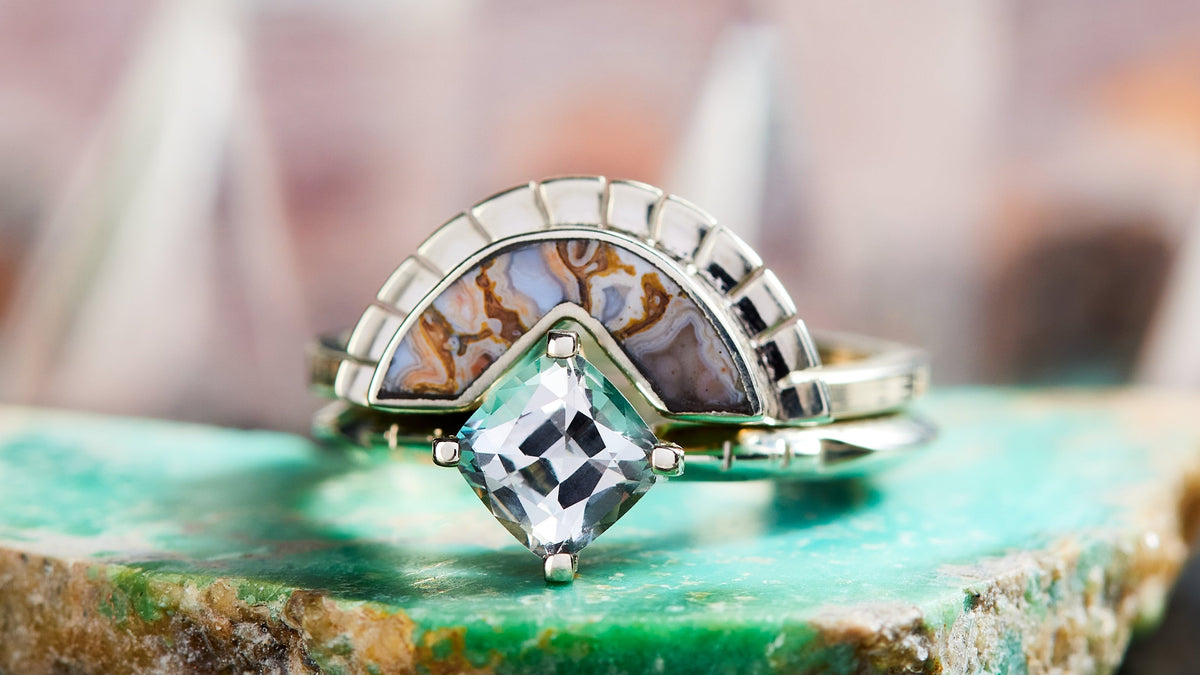 montana sapphire ring with a dinosaur bone inlay ring crown