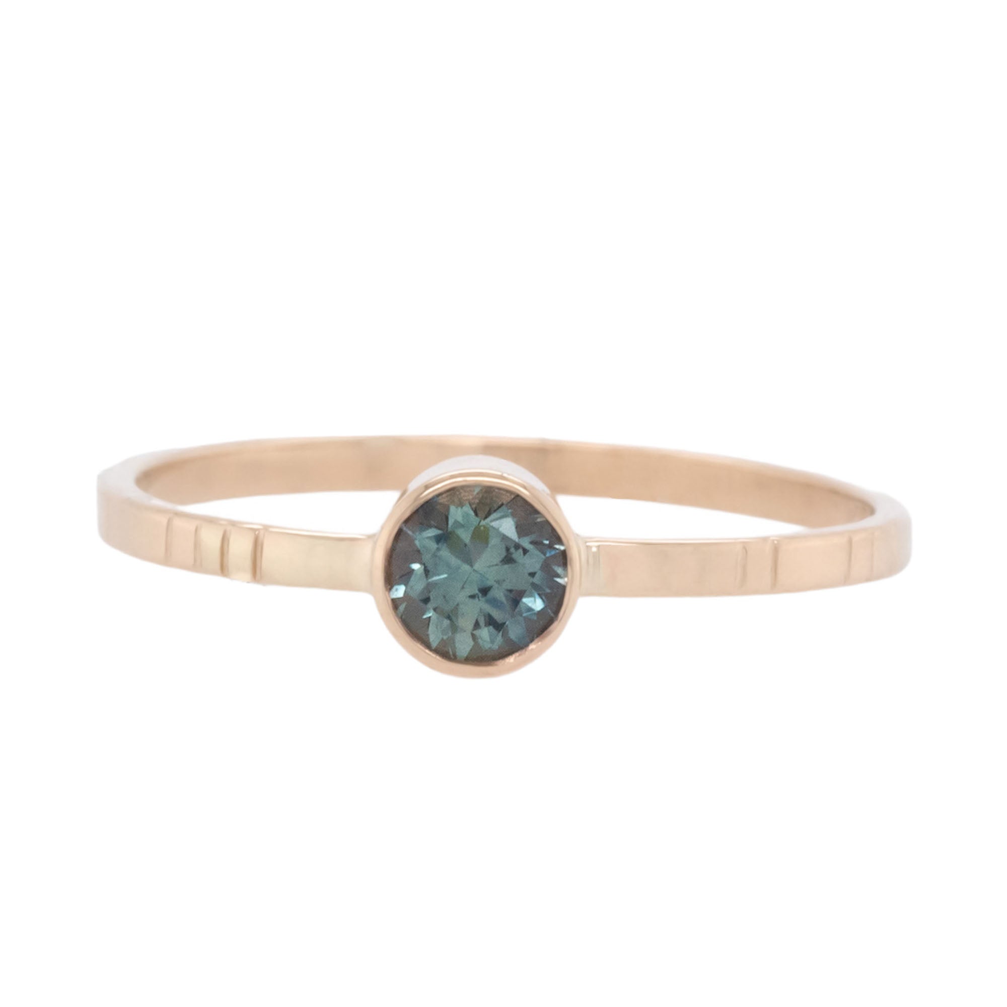 Handcrafted Modelo Ring featuring a vibrant Montana Sapphire set in sustainable metal.